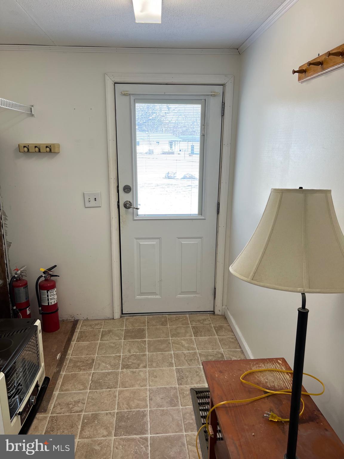 150 West Street Magnolia, DE 19962 - Photo 17 of 23 a room that has a couch and a chair in it