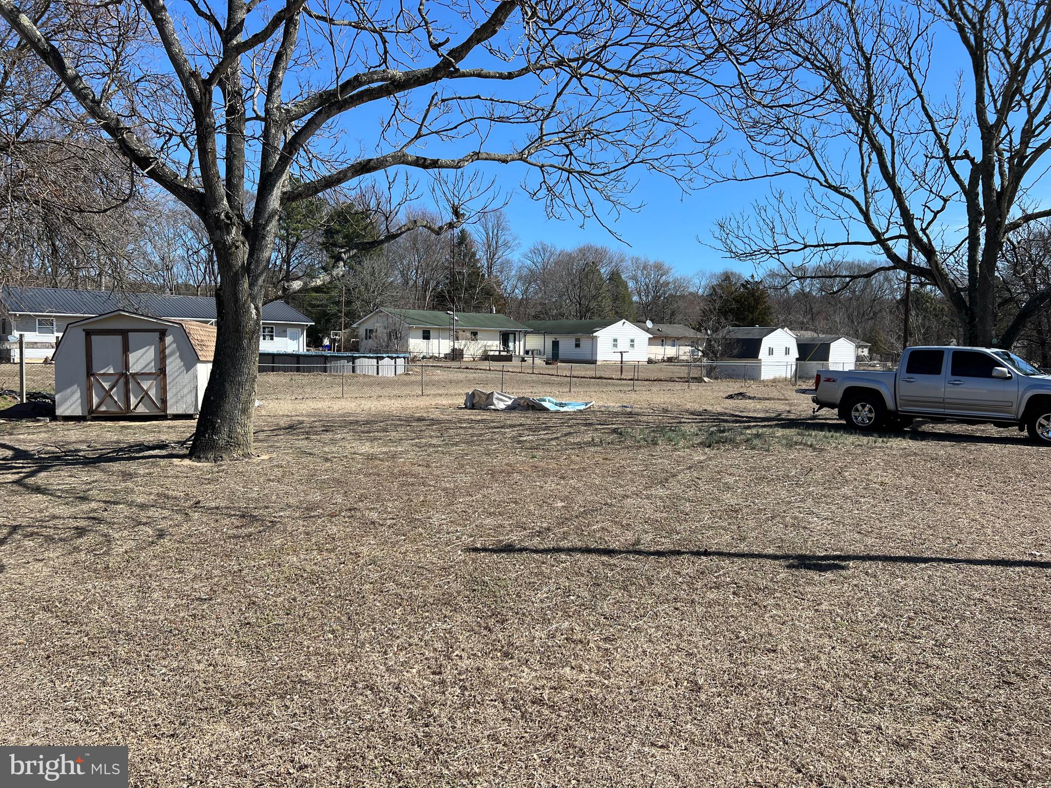 150 West Street Magnolia, DE 19962 - Photo 18 of 23 a view of a yard with a tree