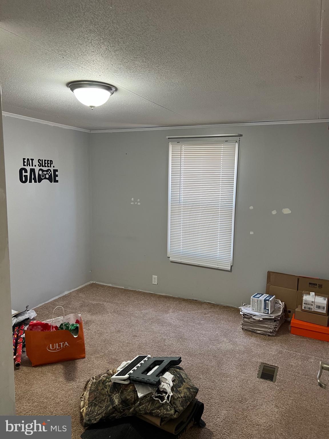 150 West Street Magnolia, DE 19962 - Photo 9 of 23 a room with a wooden floor and shoes