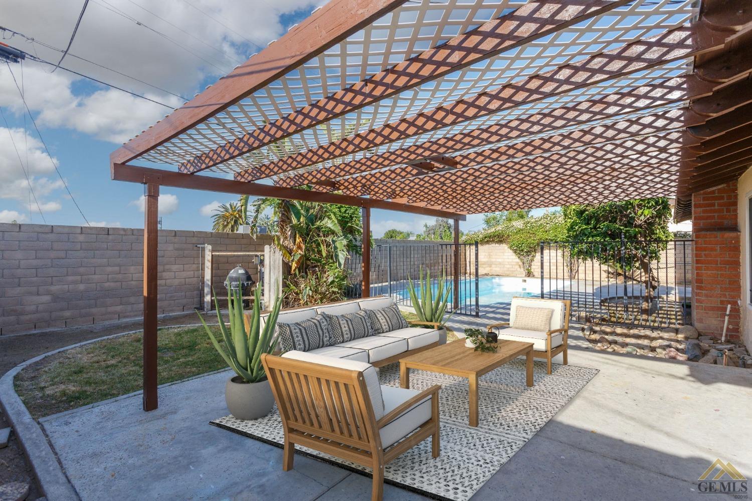 Undisclosed Address Bakersfield, CA 93308 - Photo 23 of 27 a view of a patio with couches chairs and wooden floor