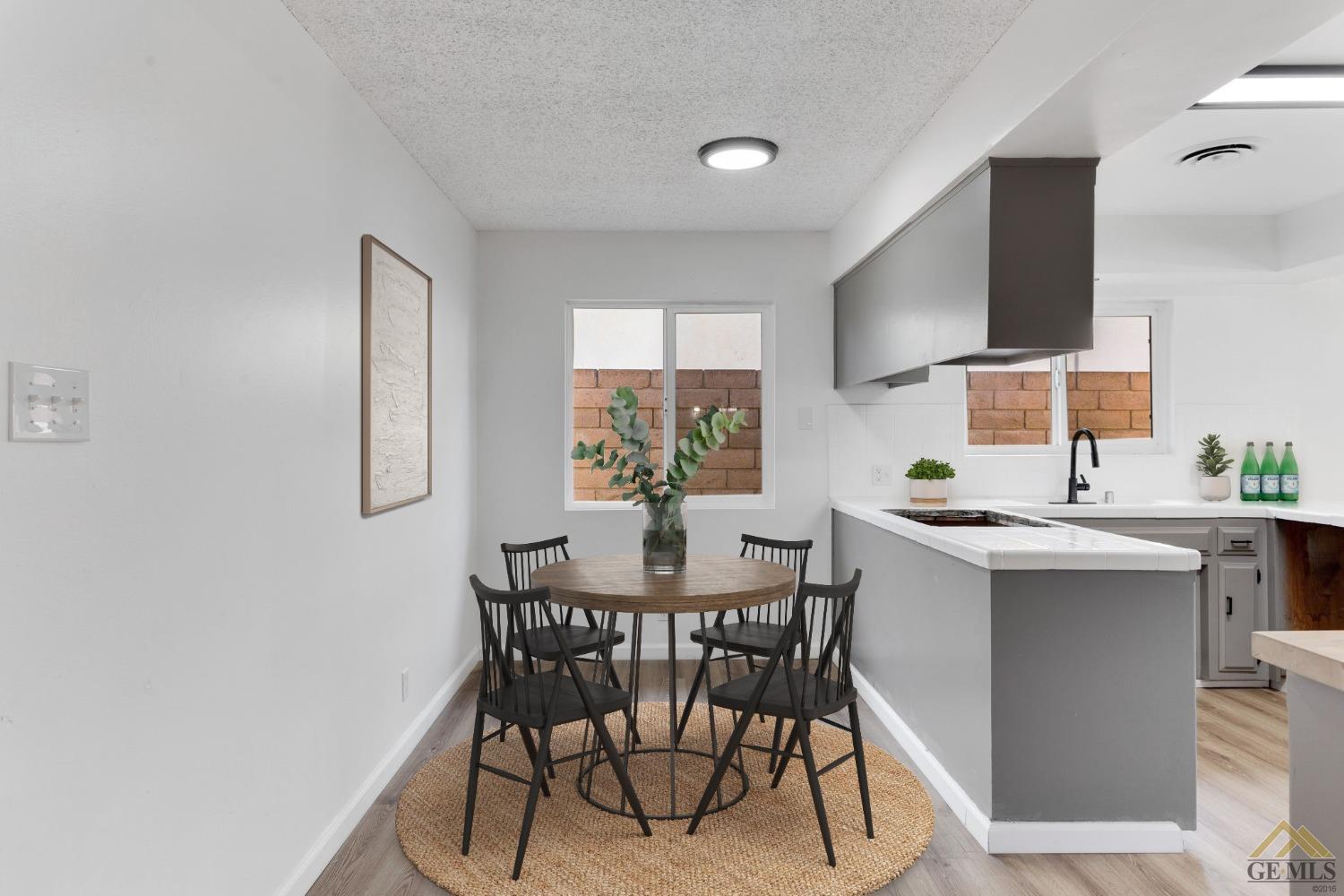 Undisclosed Address Bakersfield, CA 93308 - Photo 8 of 27 a view of a dining room with furniture and window