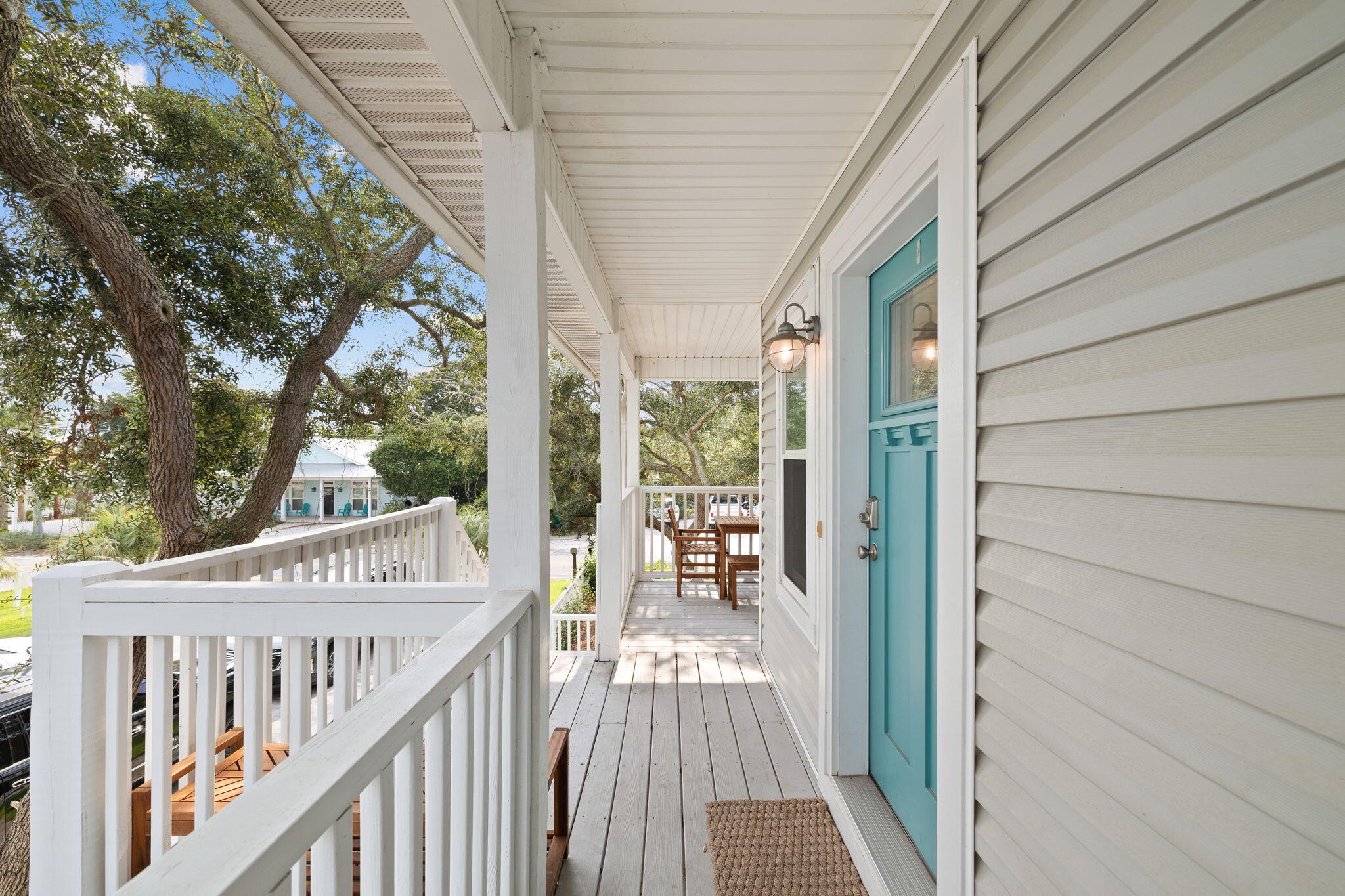 85 Dolphin Street Destin, FL 32541 - Photo 13 of 63 a view of a balcony with wooden floor