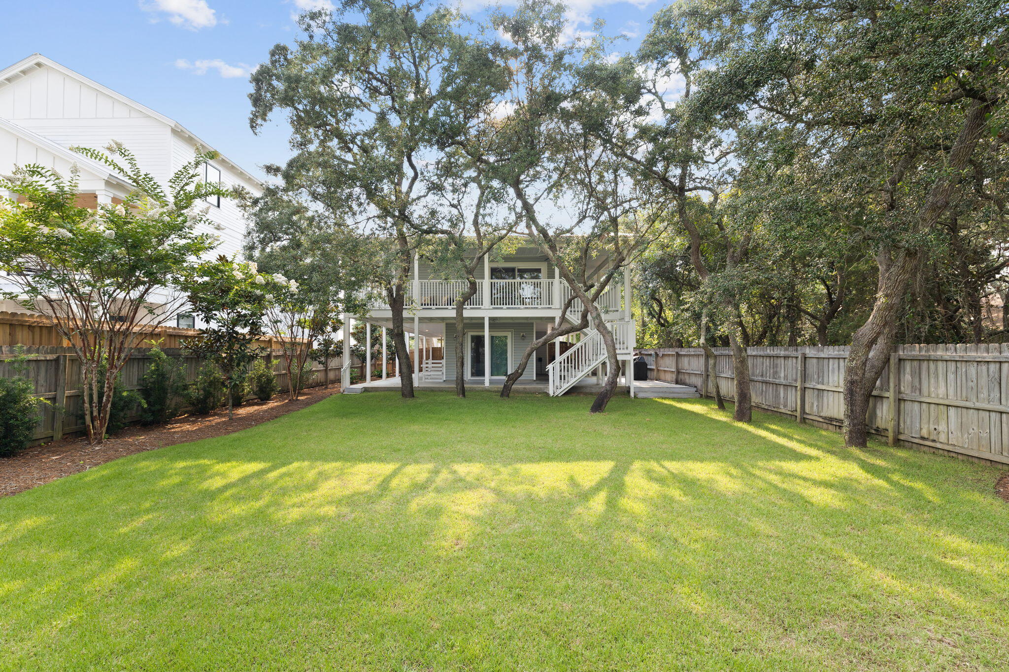 85 Dolphin Street Destin, FL 32541 - Photo 17 of 63 a view of a park with large trees