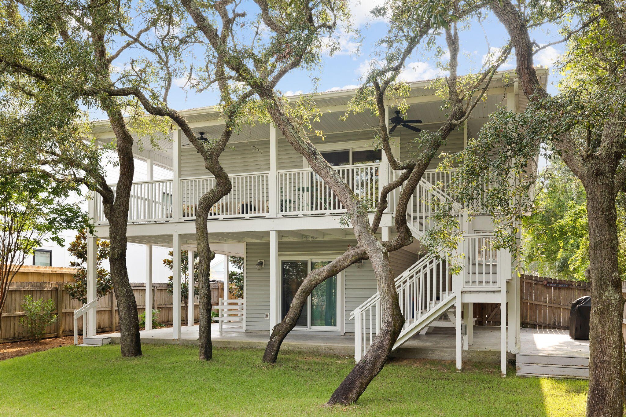85 Dolphin Street Destin, FL 32541 - Photo 19 of 63 a view of a house with a yard