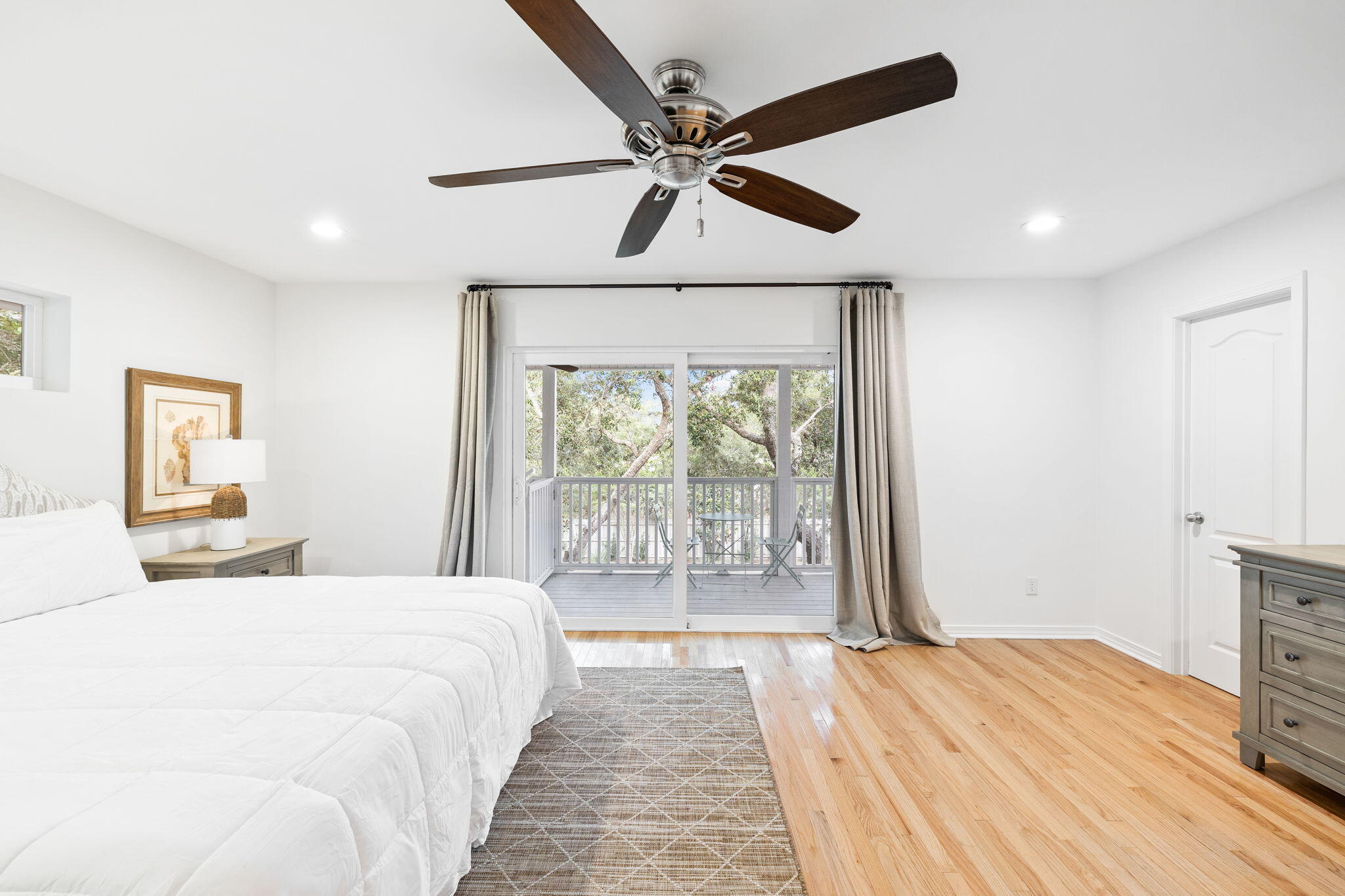 85 Dolphin Street Destin, FL 32541 - Photo 37 of 63 a bedroom with a large bed and a large window