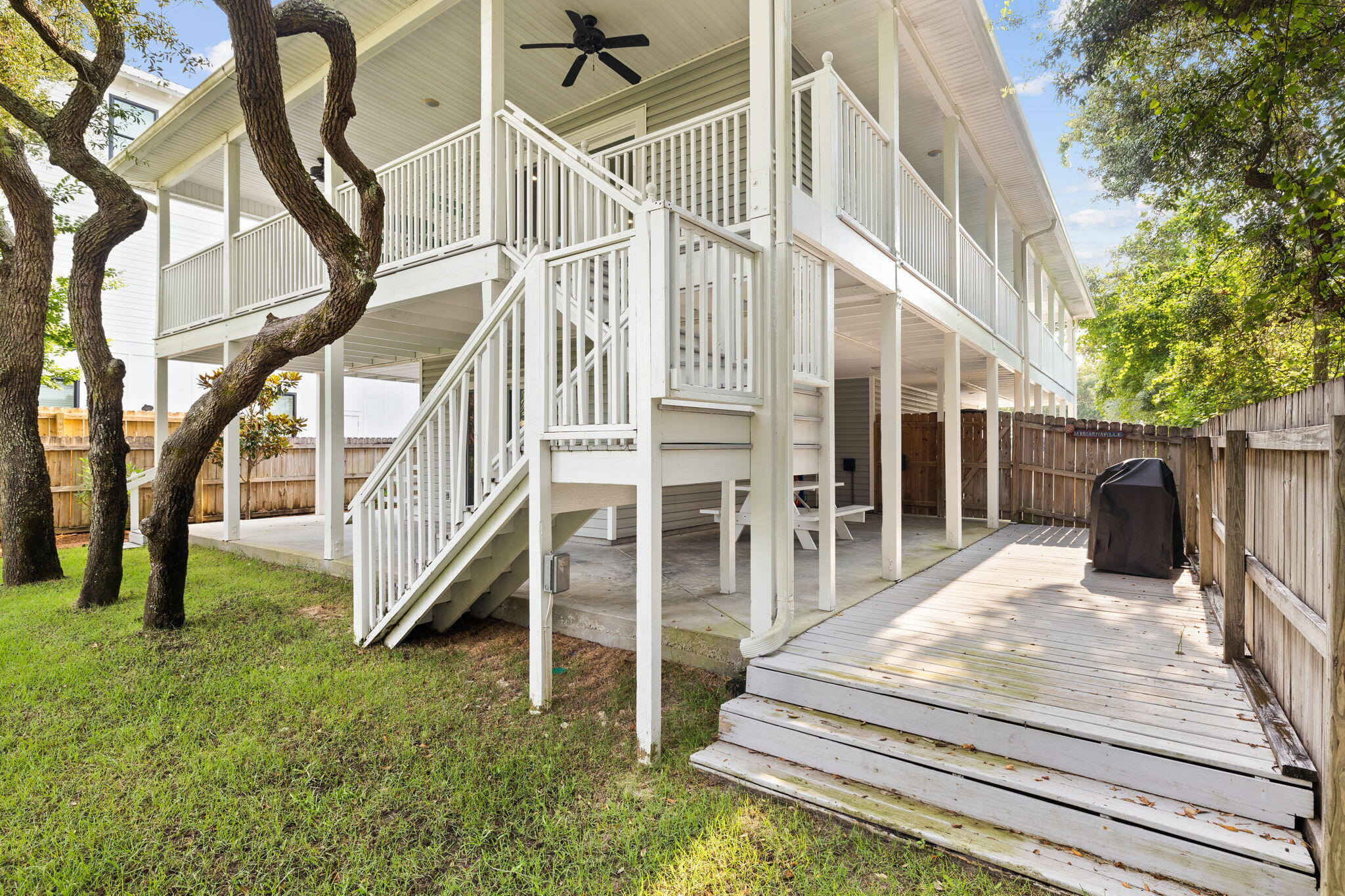 85 Dolphin Street Destin, FL 32541 - Photo 52 of 63 a view of a house with a yard
