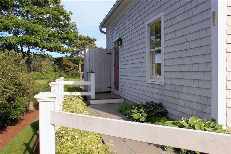 46 Lookout Road Yarmouth Port, MA 02675 - Photo 11 of 35 a front view of a house with a yard