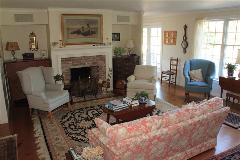 46 Lookout Road Yarmouth Port, MA 02675 - Photo 13 of 35 a living room with furniture fireplace and window