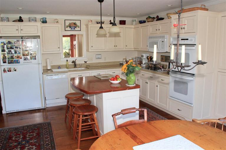 46 Lookout Road Yarmouth Port, MA 02675 - Photo 18 of 35 a kitchen with stainless steel appliances granite countertop a sink stove and refrigerator