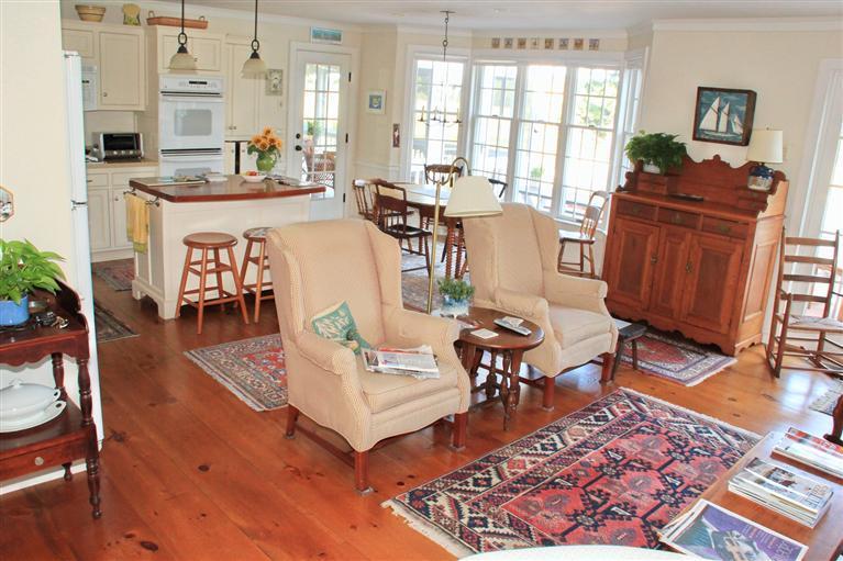 46 Lookout Road Yarmouth Port, MA 02675 - Photo 19 of 35 a living room with furniture dining table and wooden floor