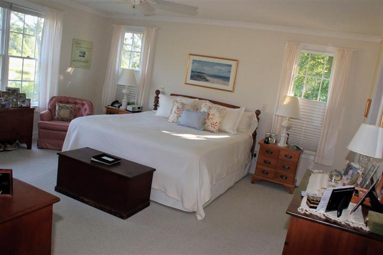 46 Lookout Road Yarmouth Port, MA 02675 - Photo 21 of 35 a bed room with a bed and a couch