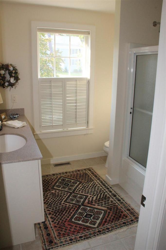 46 Lookout Road Yarmouth Port, MA 02675 - Photo 26 of 35 a bathroom with a sink a toilet and a window