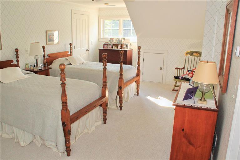 46 Lookout Road Yarmouth Port, MA 02675 - Photo 32 of 35 a living room with furniture and a table