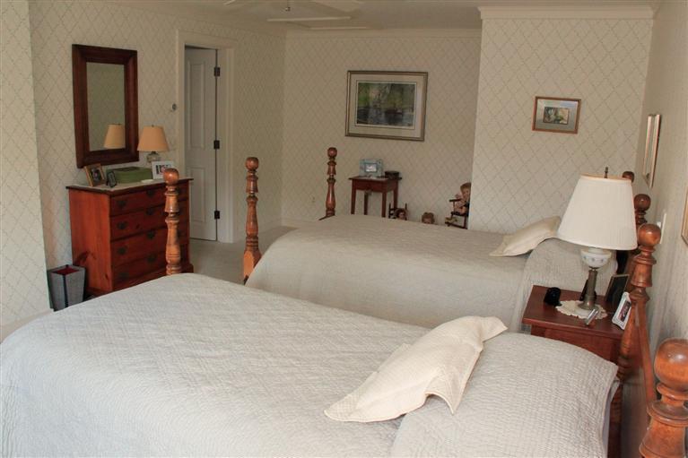 46 Lookout Road Yarmouth Port, MA 02675 - Photo 33 of 35 a bedroom with a bed and a flat screen tv