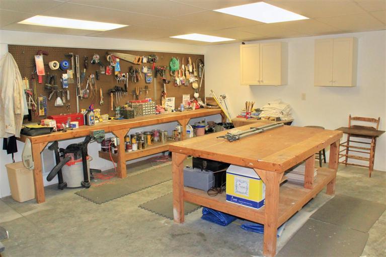 46 Lookout Road Yarmouth Port, MA 02675 - Photo 35 of 35 a utility room with stainless steel appliances a stove a sink and a refrigerator