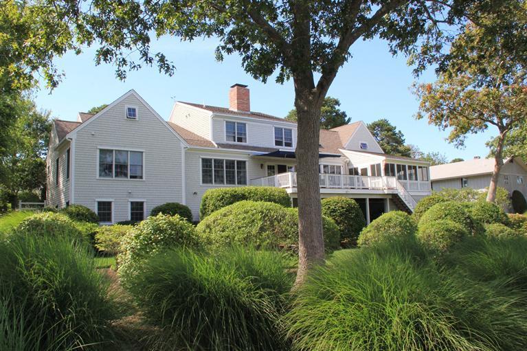 46 Lookout Road Yarmouth Port, MA 02675 - Photo 5 of 35 a front view of a house with a yard