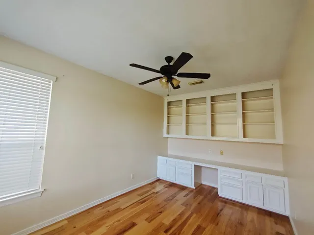 a view of a large body of water with a building in the background