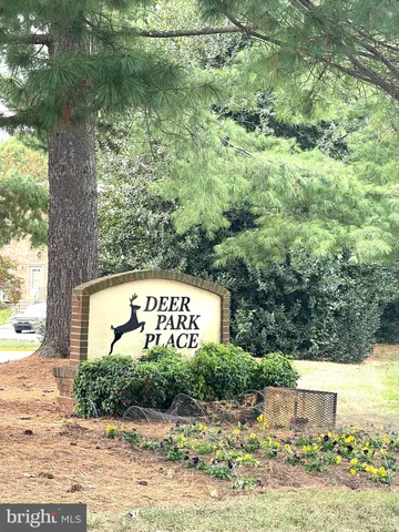 a sign that is on a brick wall