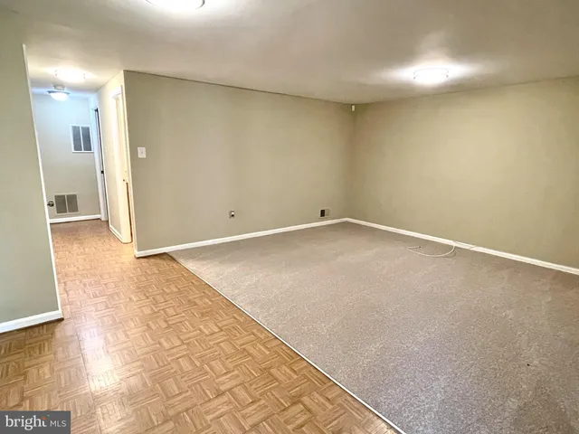 an empty room with a natural light