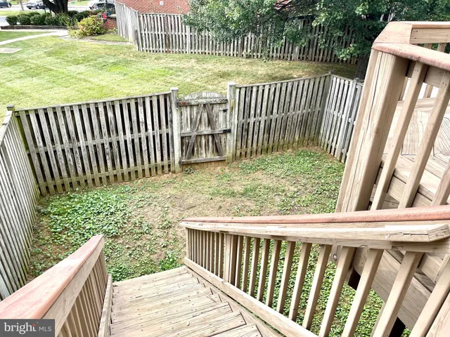 a view of a wooden fence