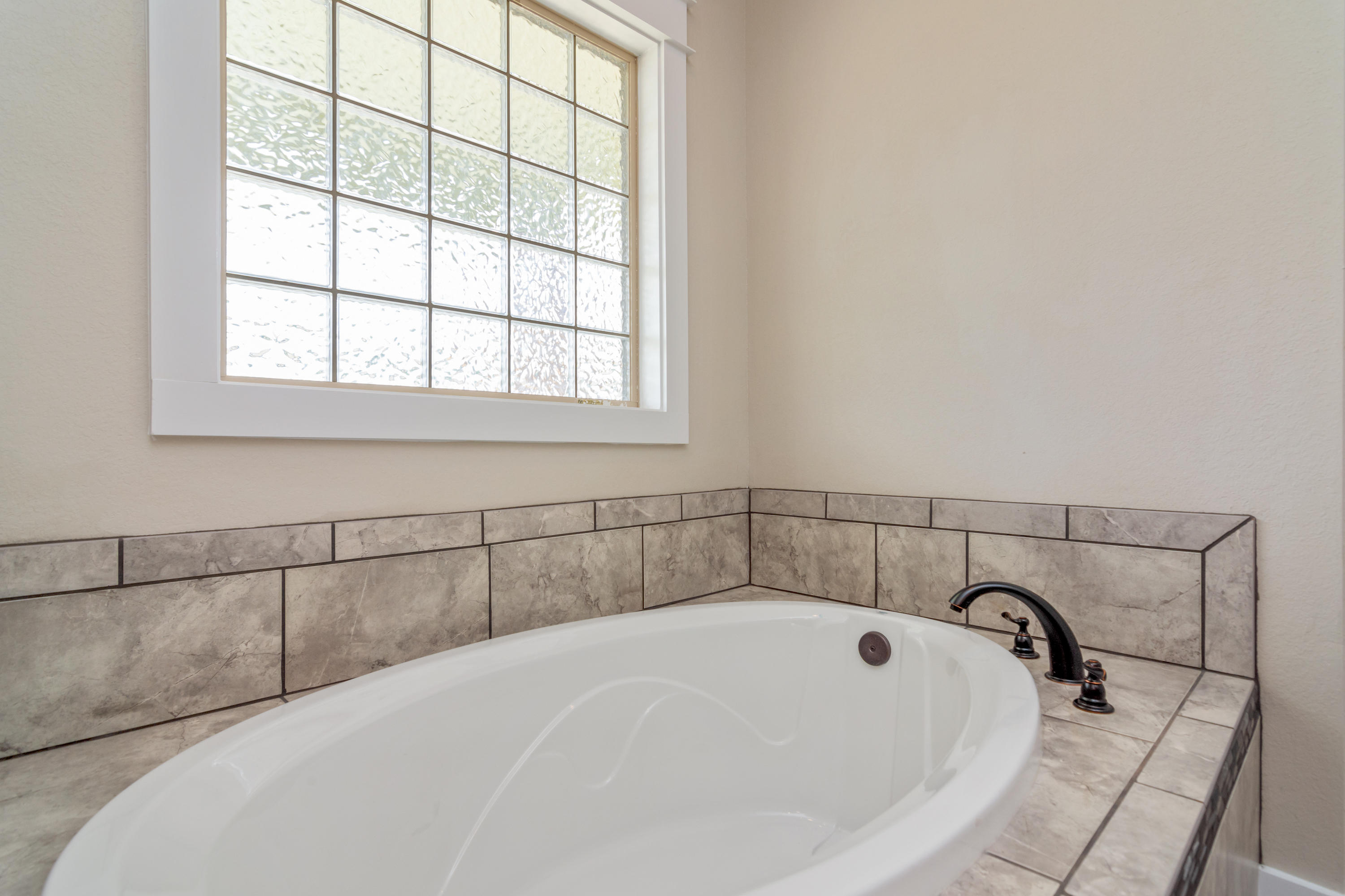 4070 Happy Trails Road Crestview, FL 32539 - Photo 22 of 34 a bathroom with a bathtub