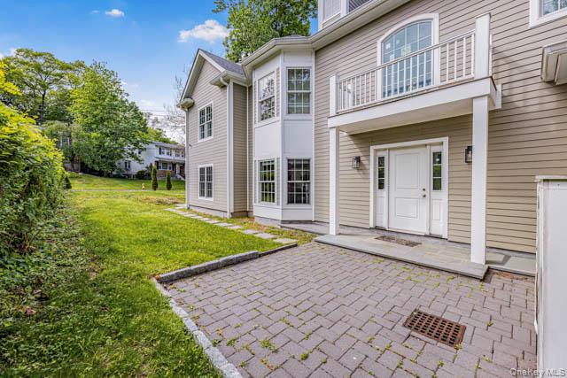 1 Kewanee Road New Rochelle, NY 10804 - Photo 23 of 36 front view of a house with a yard