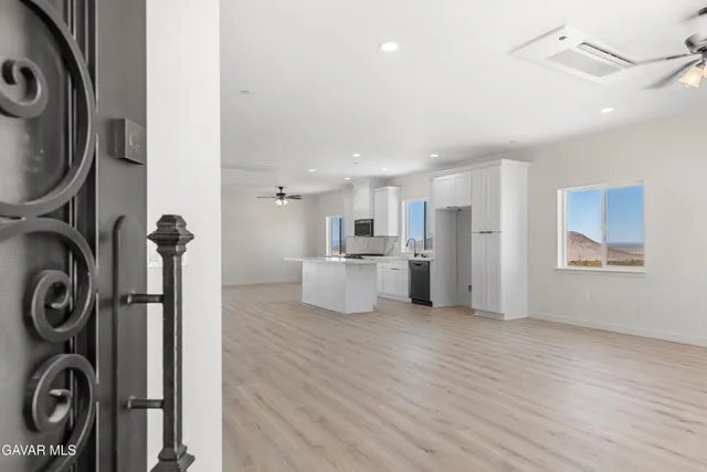 a view of a kitchen with refrigerator and washer