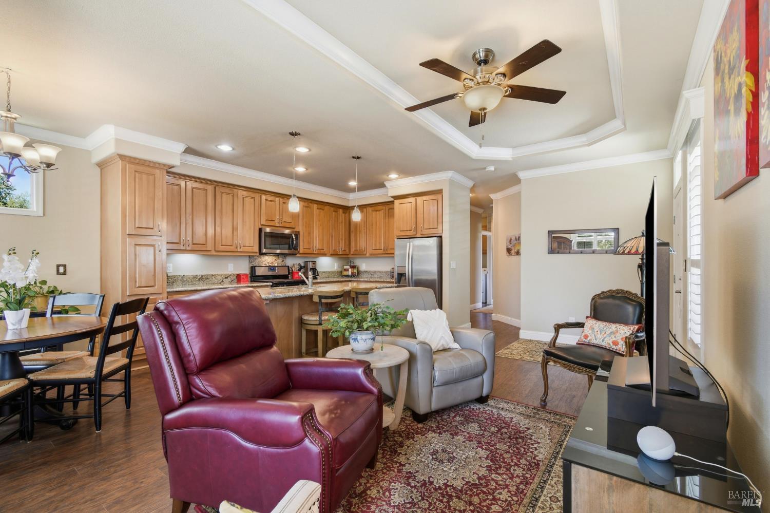120 Shamrock Circle Santa Rosa, CA 95403 - Photo 15 of 45 a living room with furniture kitchen view and a chandelier
