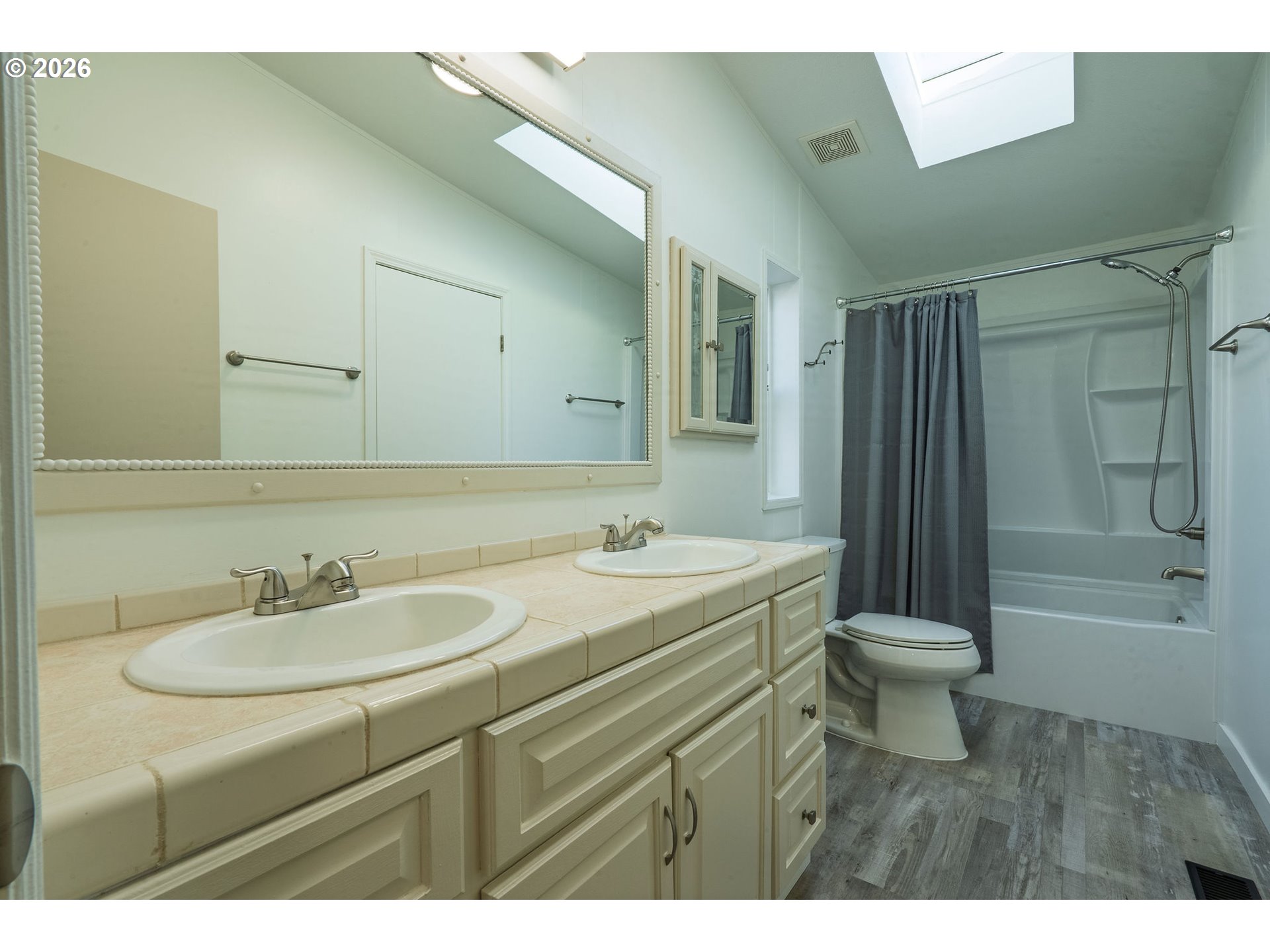 11105 Main Street Northeast Donald, OR 97020 - Photo 15 of 22 a bathroom with a sink and a mirror