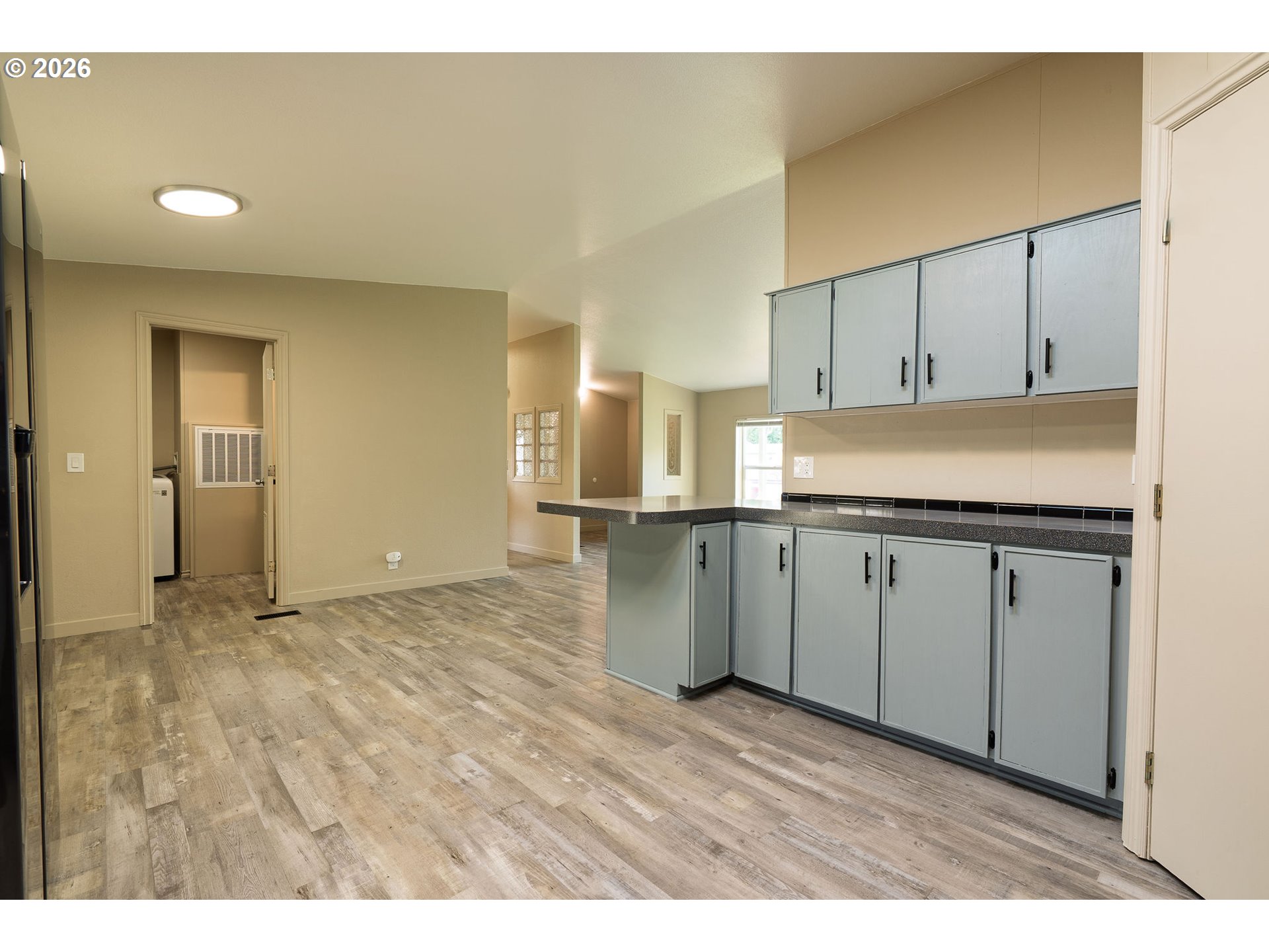 11105 Main Street Northeast Donald, OR 97020 - Photo 9 of 22 a view of kitchen with wooden floor