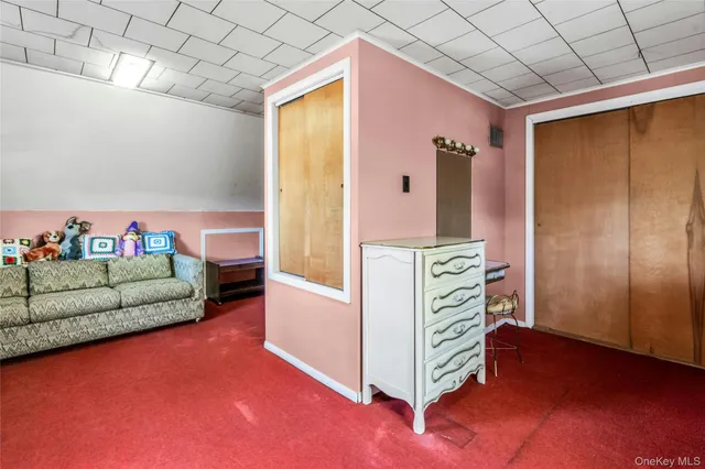 a room with furniture and a fireplace