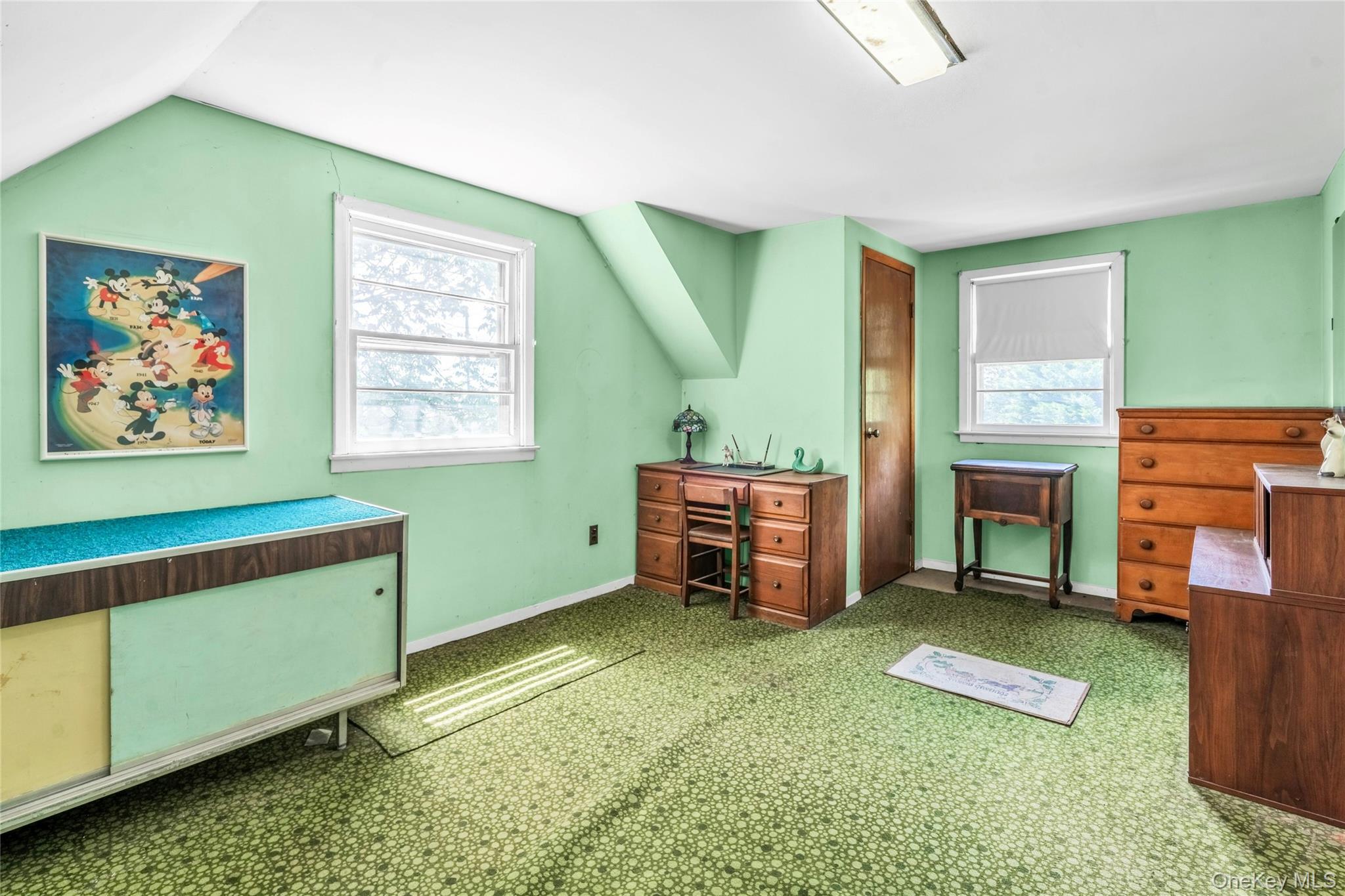 42 Summit Street Plainview, NY 11803 - Photo 16 of 22 a room with furniture and a fireplace