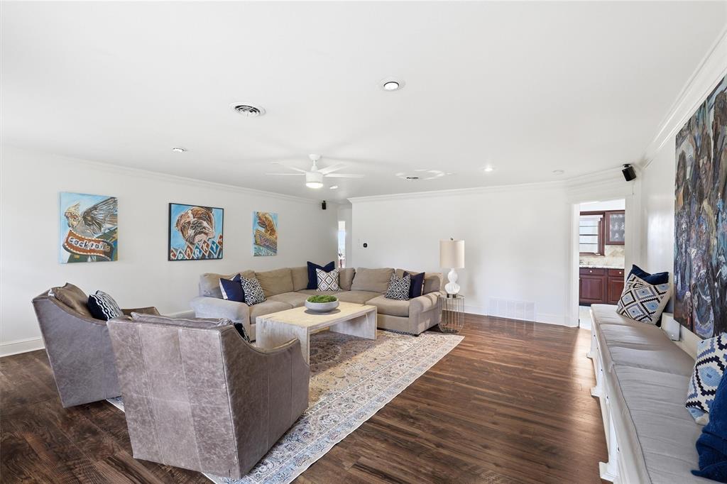 6724 Kirkwood Road Fort Worth, TX 76116 - Photo 15 of 40 a living room with furniture wooden floor and a rug