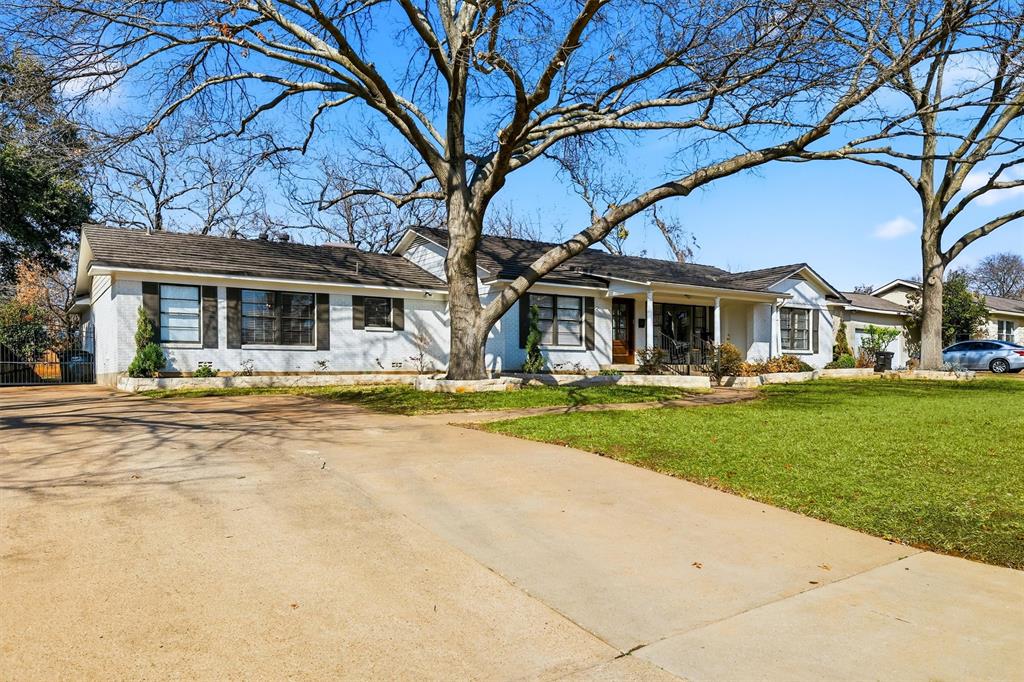 6724 Kirkwood Road Fort Worth, TX 76116 - Photo 2 of 40 a front view of house with yard and green space