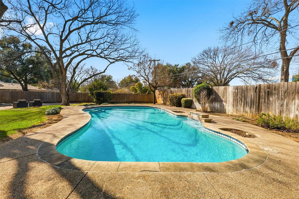 6724 Kirkwood Road Fort Worth, TX 76116 - Photo 37 of 40 a view of a swimming pool with a yard