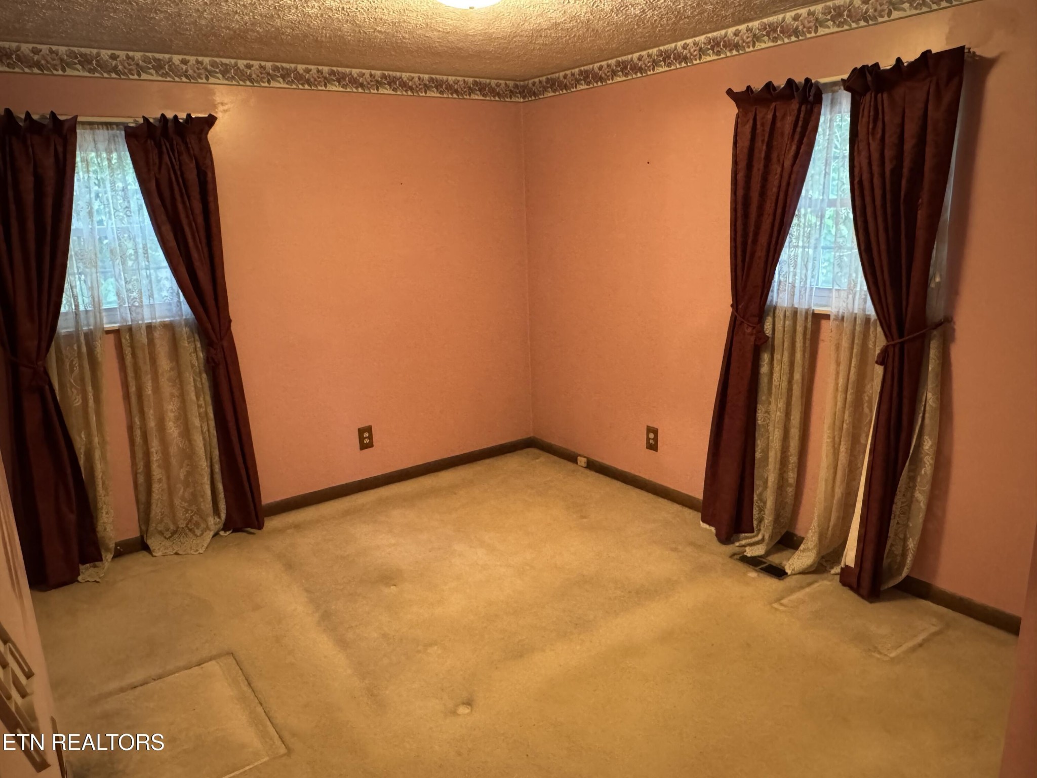 372 Walnut Valley Road Clinton, TN 37716 - Photo 13 of 22 a view of walk in closet with clothes and shoes