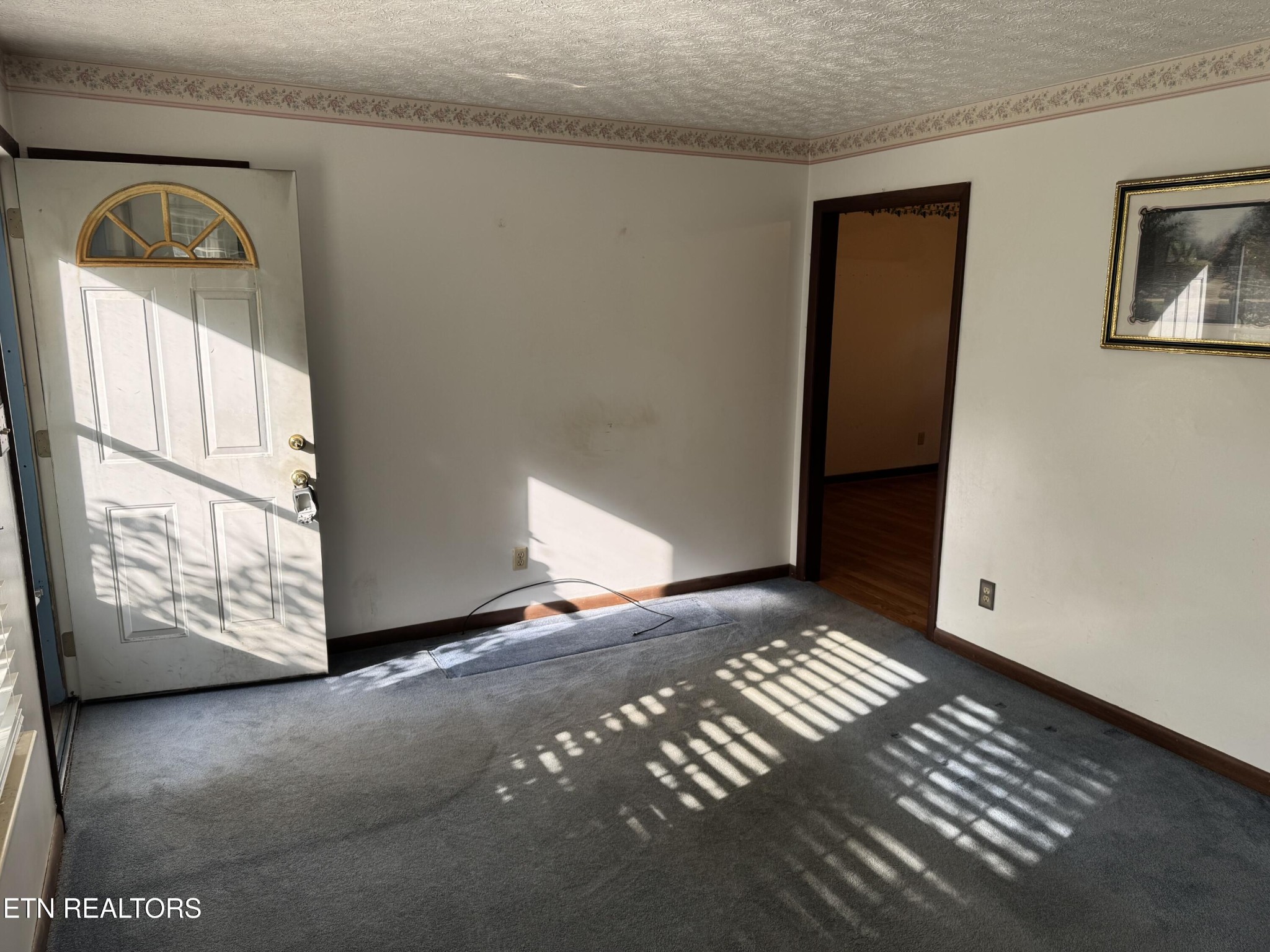 372 Walnut Valley Road Clinton, TN 37716 - Photo 5 of 22 a view of an empty room and a window