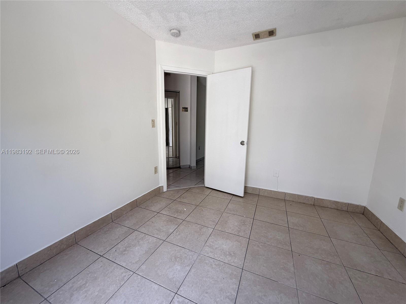 18260 Southwest 142nd Place Miami, FL 33177 - Photo 16 of 30 a view of an empty room