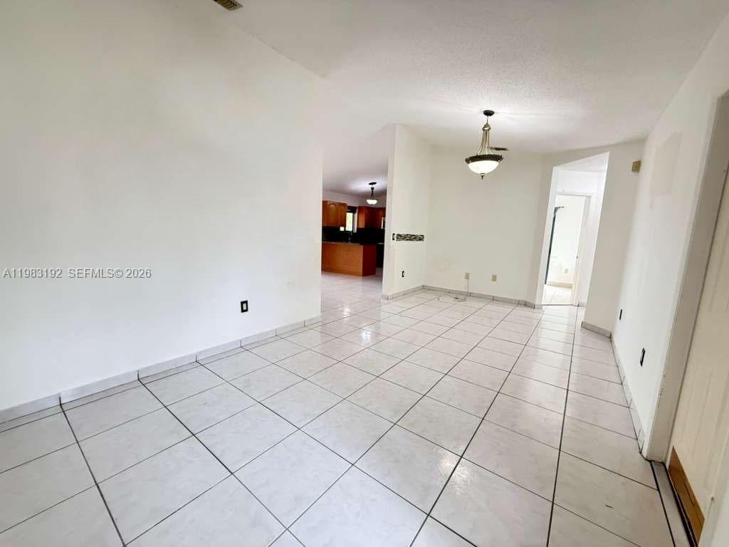 18260 Southwest 142nd Place Miami, FL 33177 - Photo 24 of 30 a view of a livingroom with wooden floor