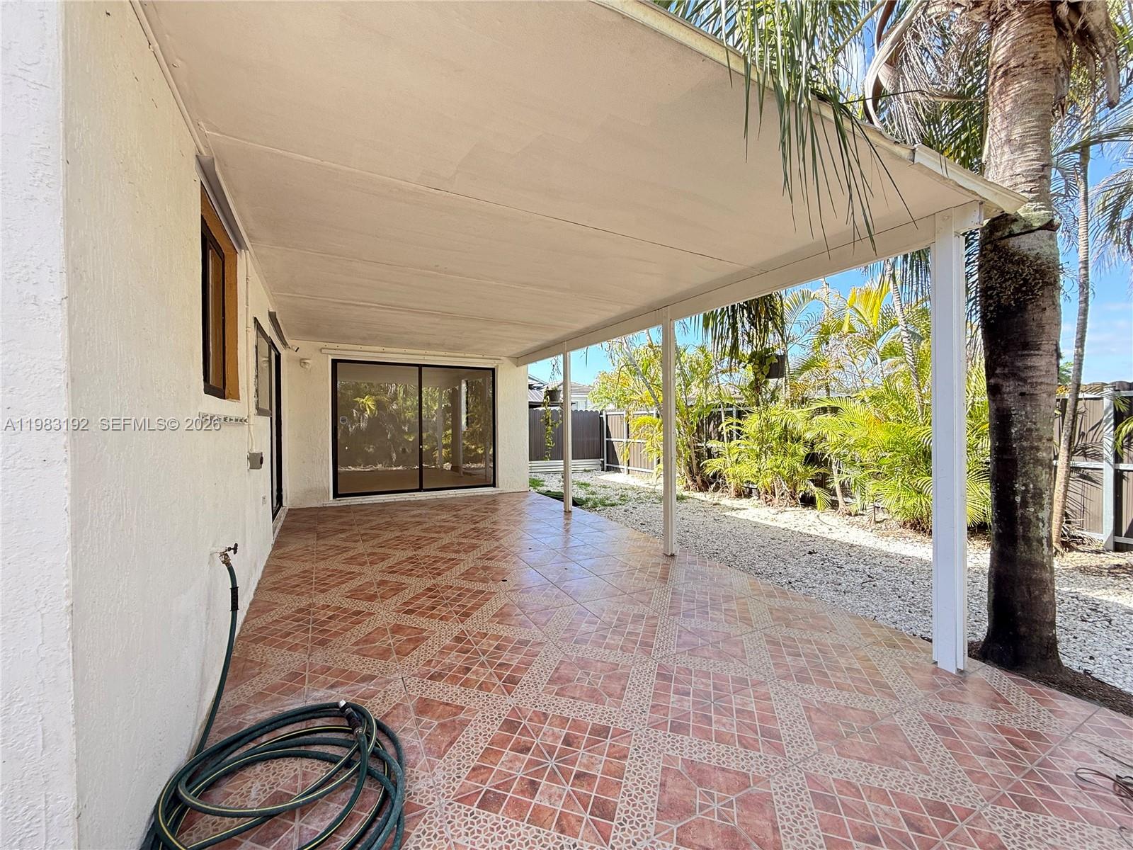 18260 Southwest 142nd Place Miami, FL 33177 - Photo 28 of 30 a view of porch with seating space