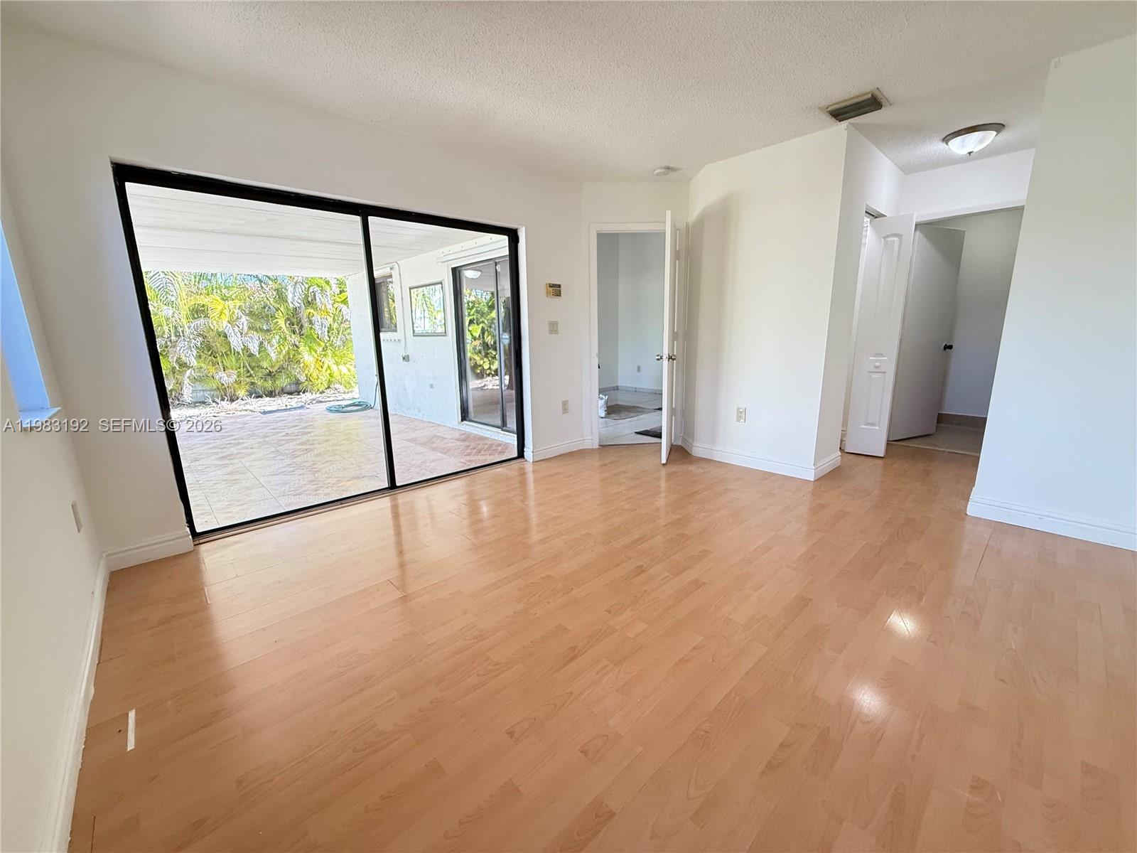 18260 Southwest 142nd Place Miami, FL 33177 - Photo 5 of 30 a view of an empty room with a window