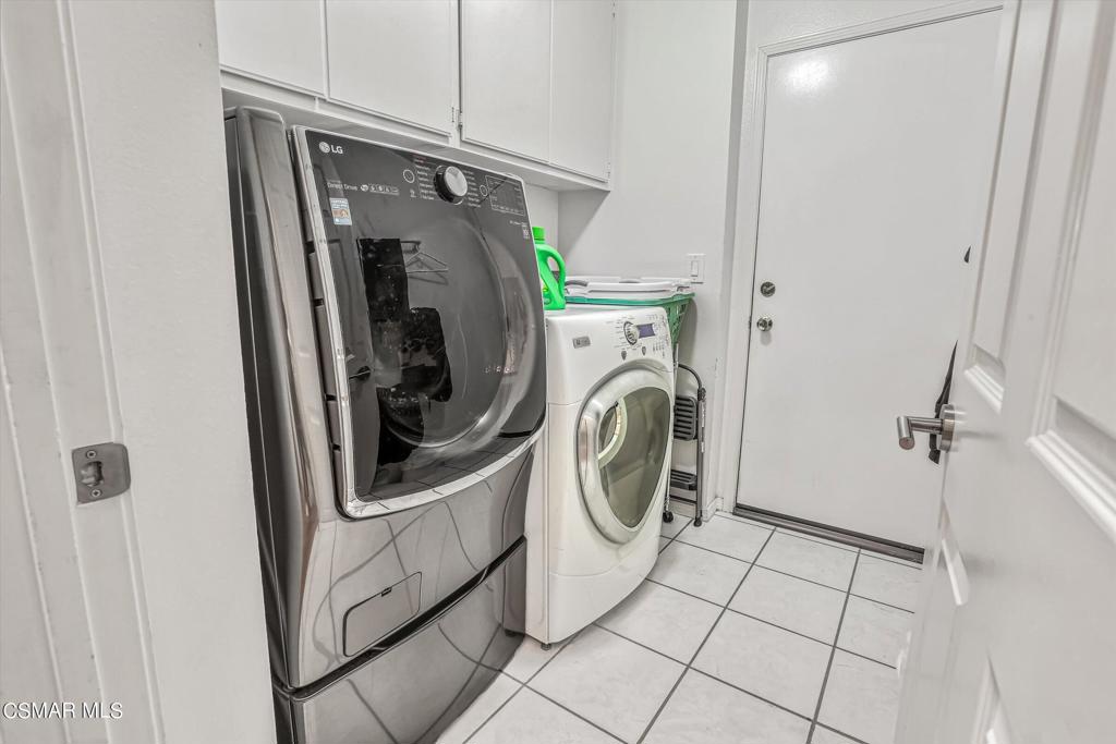 11816 Maple Crest Street Moorpark, CA 93021 - Photo 22 of 51 a utility room with dryer and washer