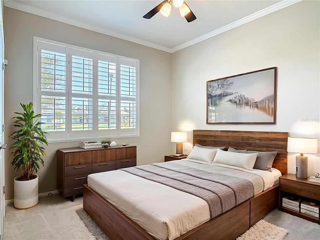 1632 Delphi Way New Smyrna Beach, FL 32168 - Photo 23 of 52 a bedroom with a large bed and a potted plant