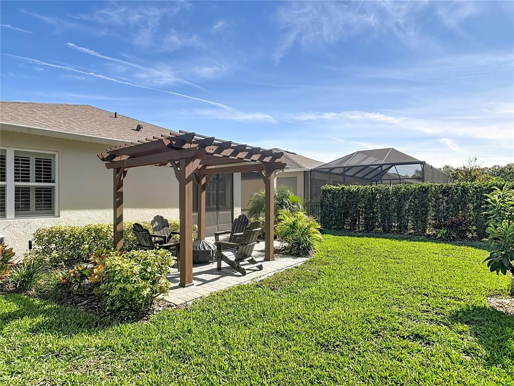 1632 Delphi Way New Smyrna Beach, FL 32168 - Photo 44 of 52 a view of a house with yard and sitting area