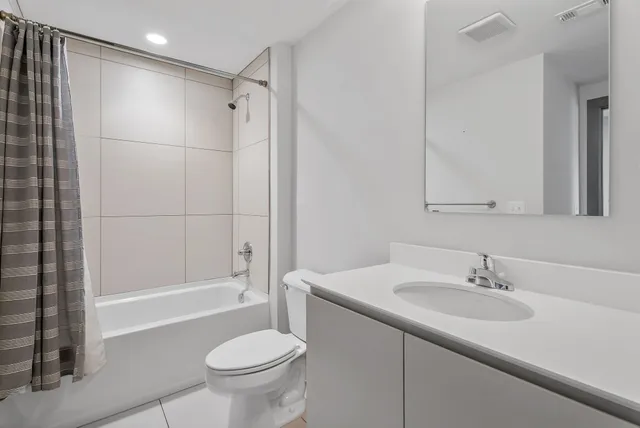 a view of a hallway with workspace