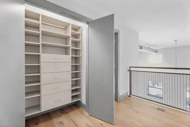 a view of a hallway with washer and dryer