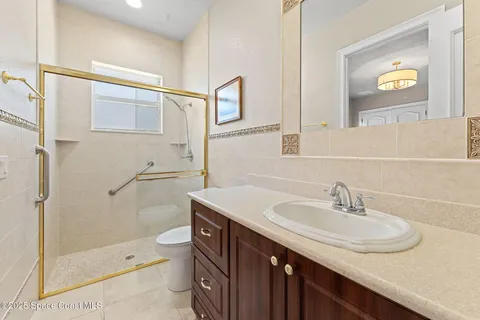 a bed room with a bed and a couch