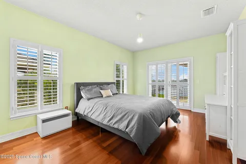 a view of a balcony with lake view and mountain view
