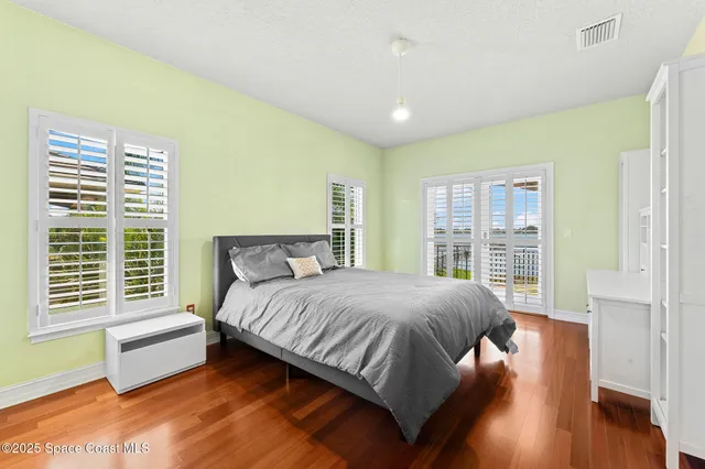 a bed room with a bed and a couch