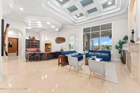 a spacious bathroom with a granite countertop sink and a large mirror